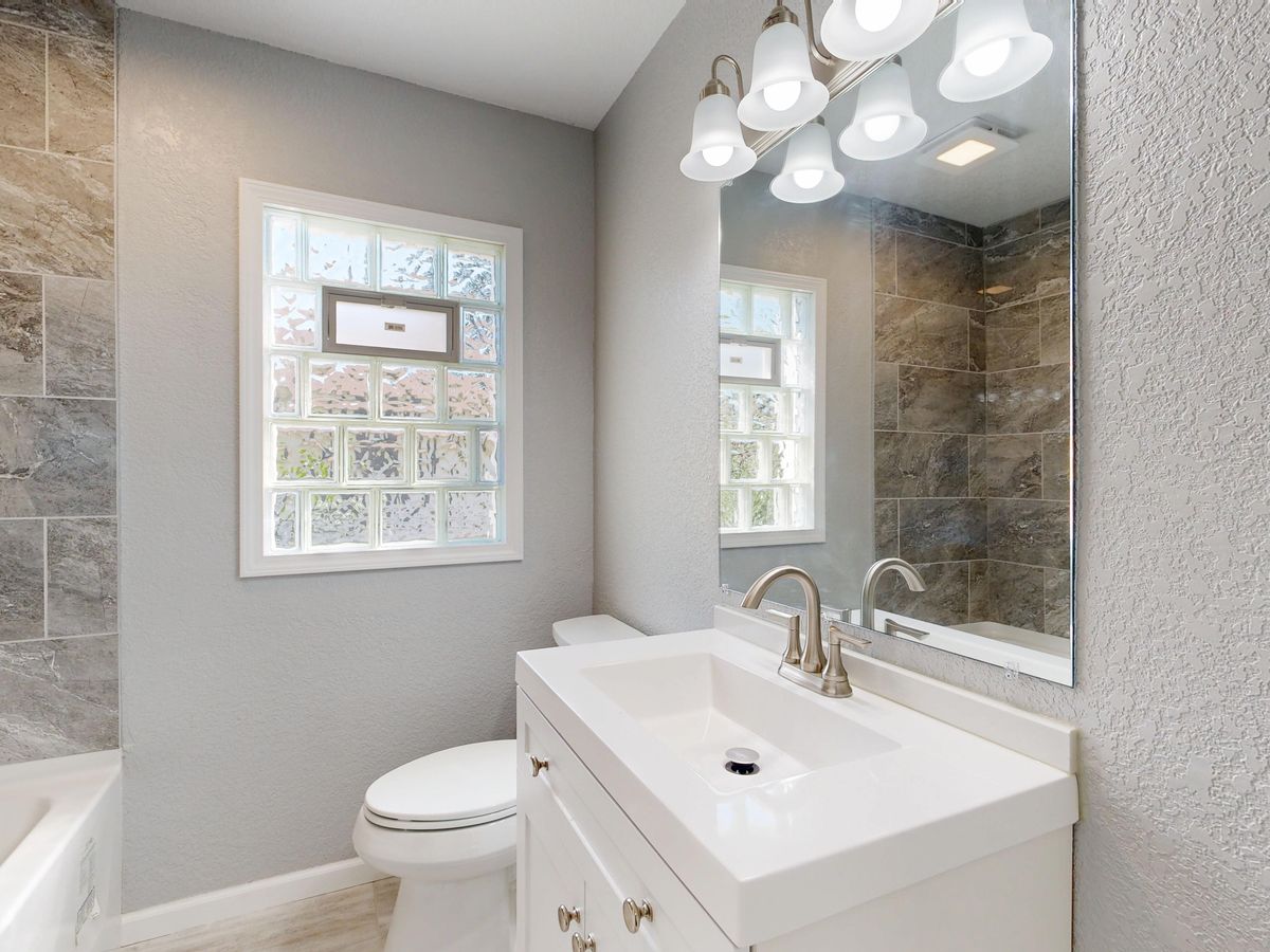 Modern bathroom vanity and finishes installed by Art Lego LLC