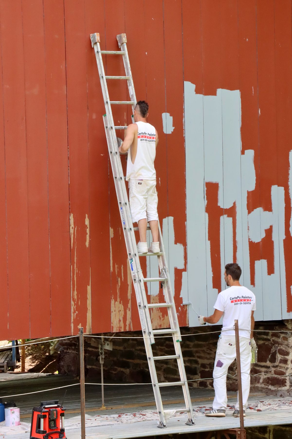 Exterior painting and prep work with ladder by Art Lego LLC