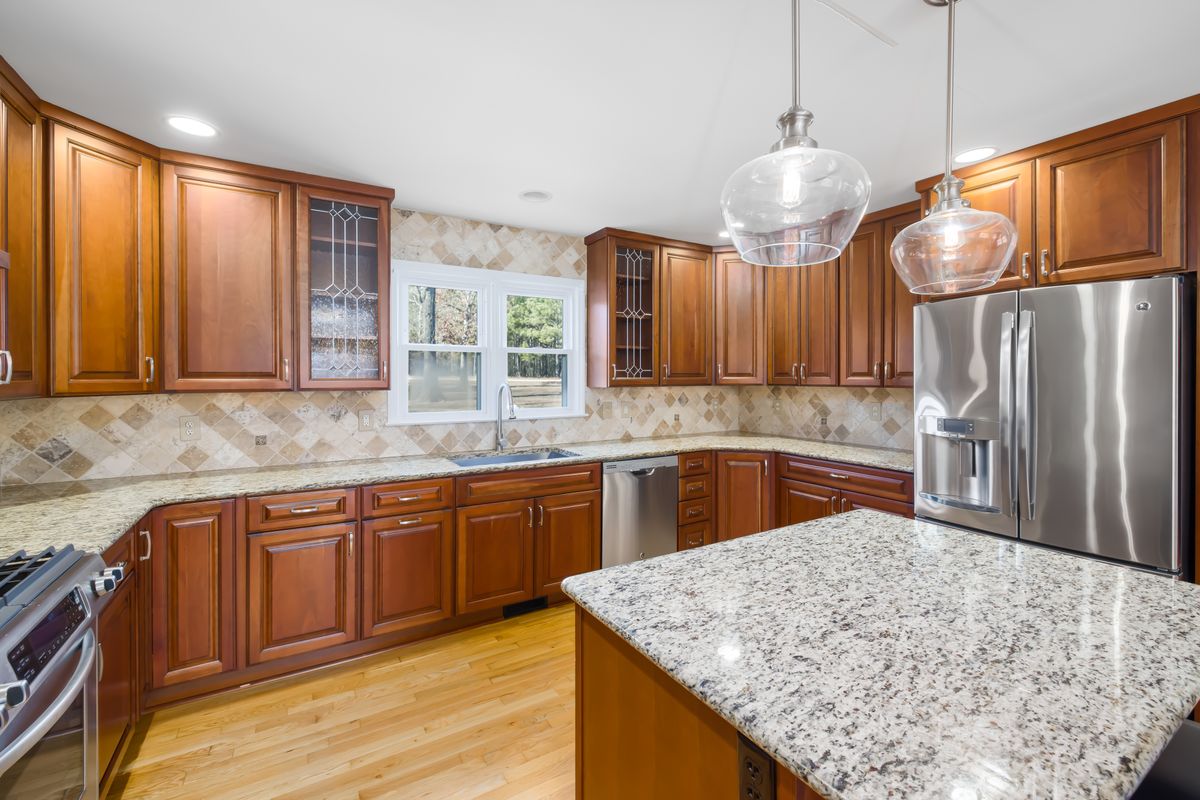 Open kitchen remodel with modern finishes by Art Lego LLC
